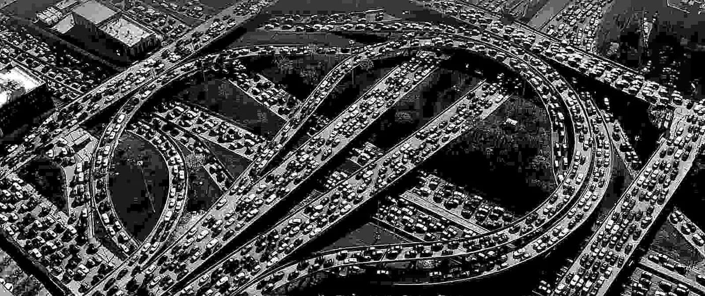 A real-world driver behind the wheel, framed as the modern equivalent of a Borg